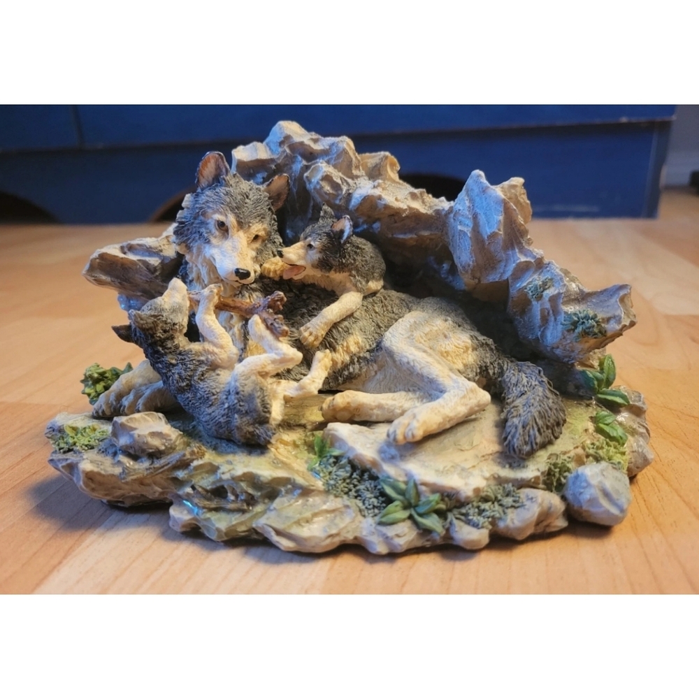 Vintage wolf den figurine